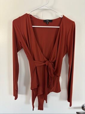 Lulu's Burnt Orange Long-Sleeve Tie-Front Bodysuit
